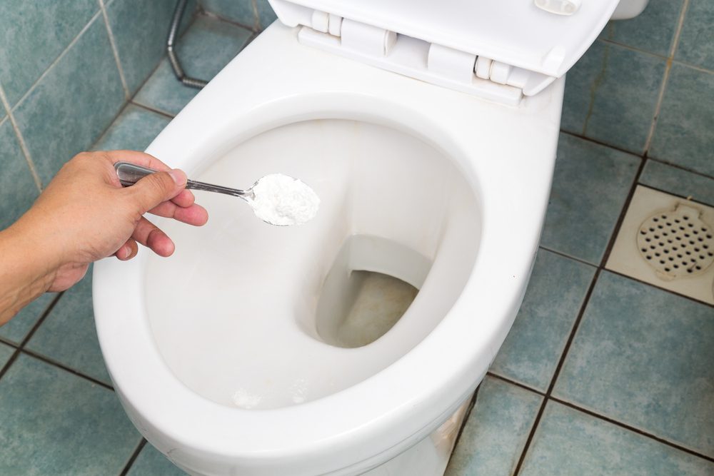 Baking soda used to clean and disinfect bathroom and toilet bowl