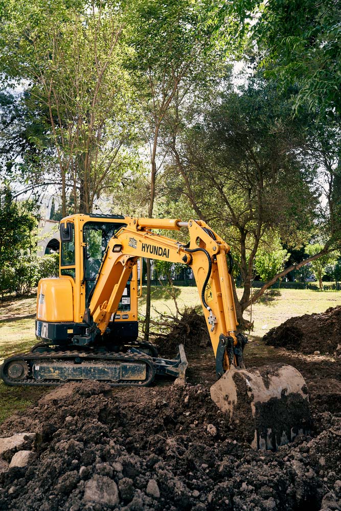 Crawler excavator digs