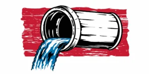 Water flowing freely through a clean pipe after using the best sewer line cleaner.